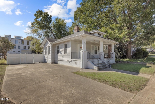 810 E Edenton St, Raleigh, NC 27601 - view of front of property featuring covered porch, a chimney, and crawl space