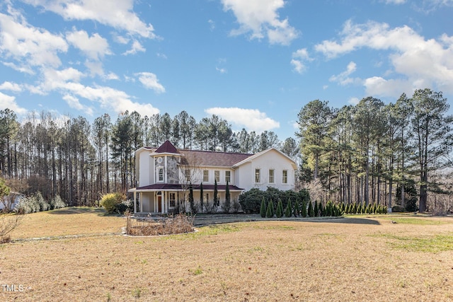 view of front of home featuring a porch and a front yard