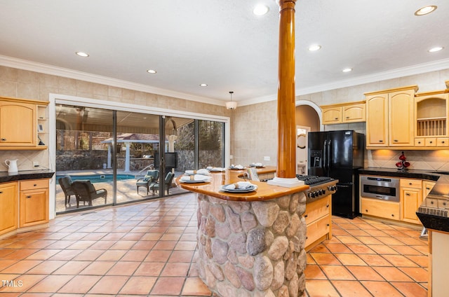 kitchen featuring light brown cabinetry, a center island, black refrigerator with ice dispenser, and wall oven