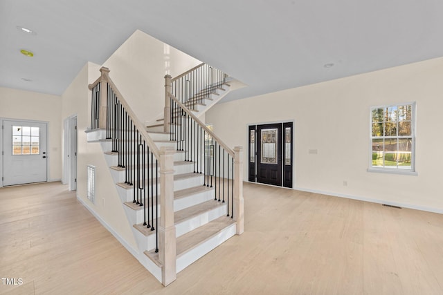 entryway with light hardwood / wood-style flooring