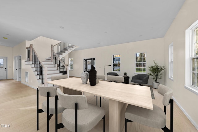 dining room featuring light hardwood / wood-style flooring