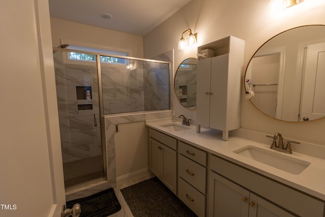 bathroom with vanity, tile patterned flooring, and an enclosed shower