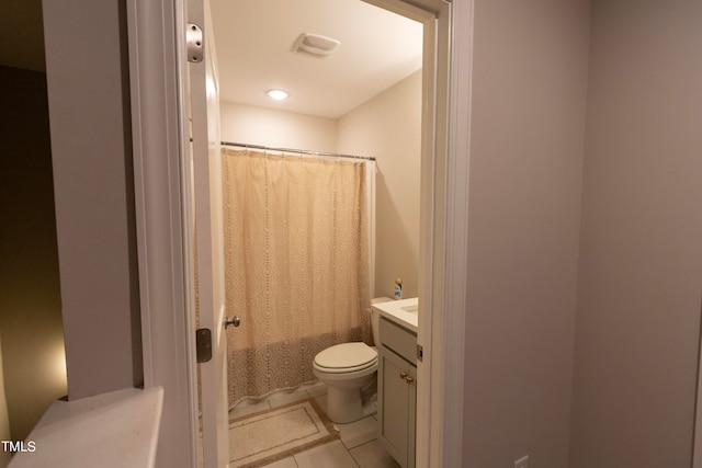 full bathroom with vanity, shower / bath combination with curtain, toilet, and tile patterned floors