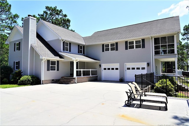 view of front of home with a garage