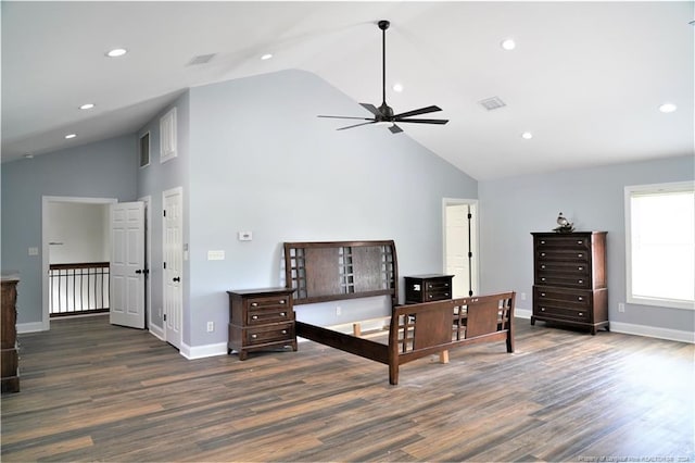 bedroom with dark hardwood / wood-style floors and high vaulted ceiling