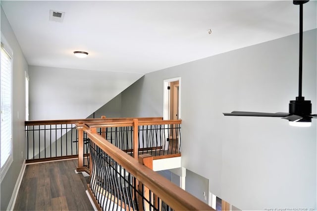 corridor with dark wood-type flooring