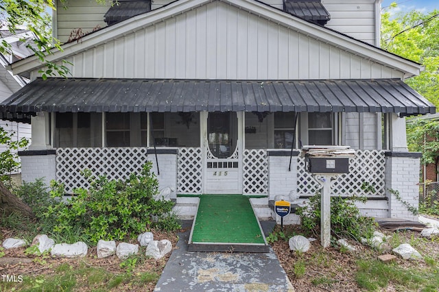 view of front of home with a standing seam roof and metal roof