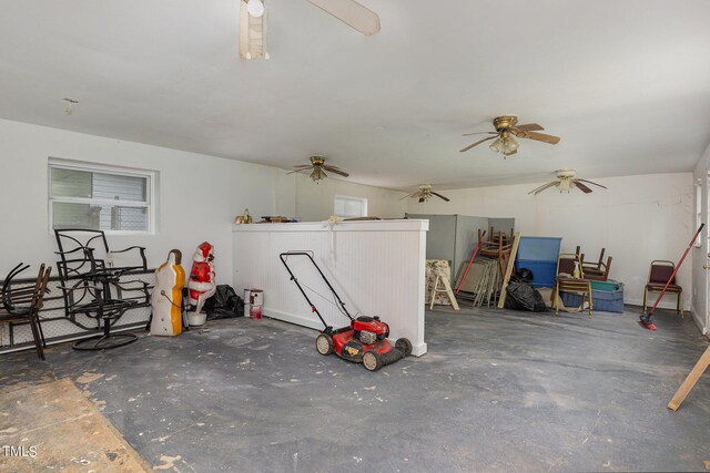 interior space featuring ceiling fan