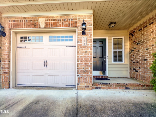 property entrance with a garage