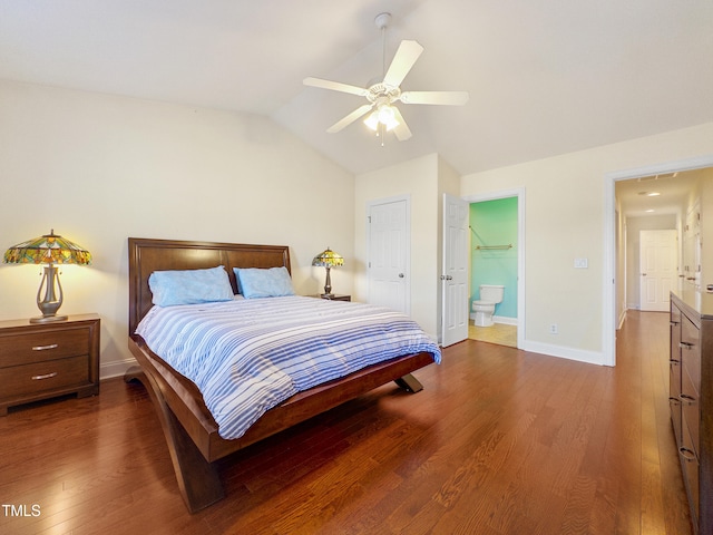 bedroom with dark hardwood / wood-style floors, a closet, vaulted ceiling, ensuite bathroom, and ceiling fan