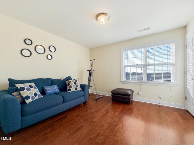 living room featuring dark hardwood / wood-style floors