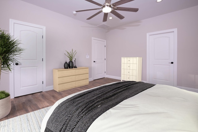 bedroom featuring dark wood-type flooring and ceiling fan