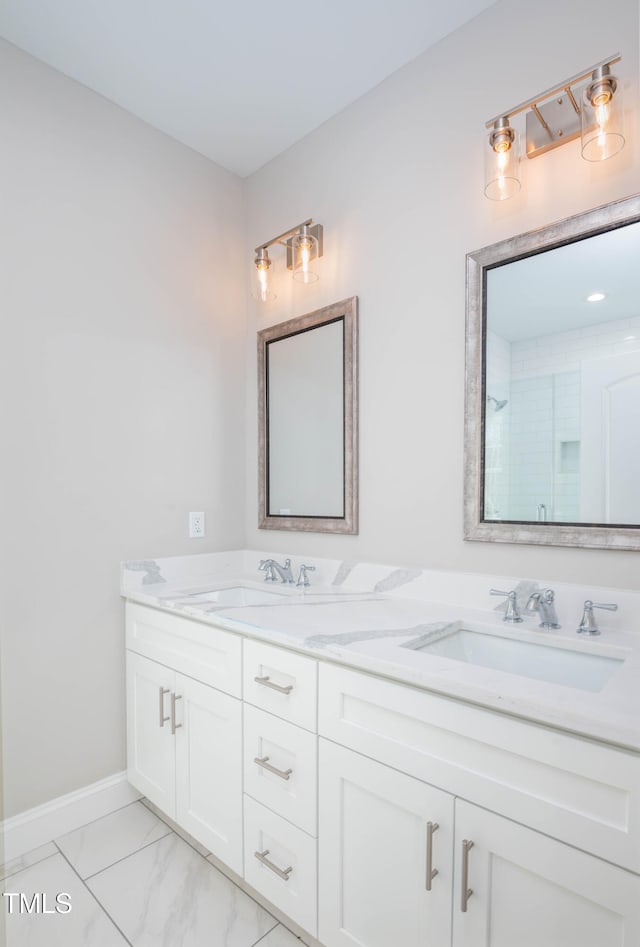 bathroom featuring vanity and walk in shower