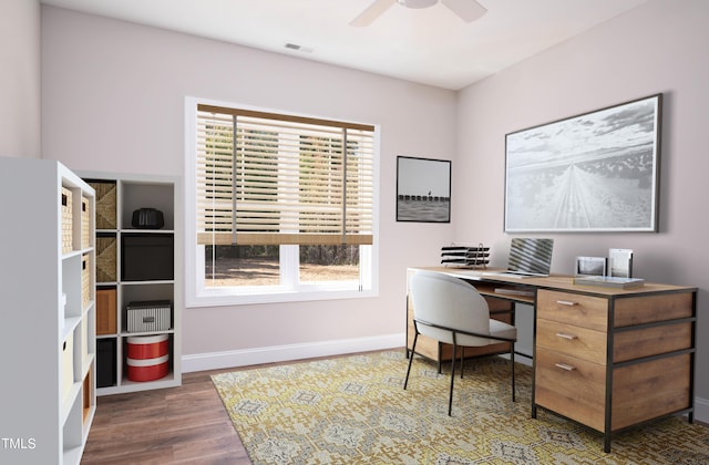 office with ceiling fan and dark hardwood / wood-style flooring