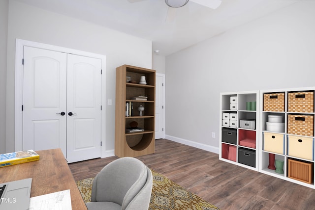 office space featuring dark wood-type flooring and ceiling fan