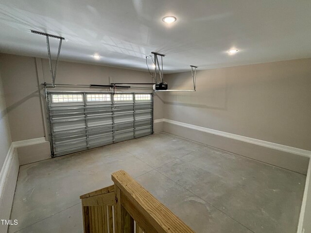 garage featuring a garage door opener