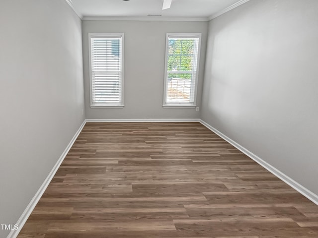 1505 Juniper St, Durham, NC 27703 - spare room with ornamental molding, wood finished floors, and baseboards