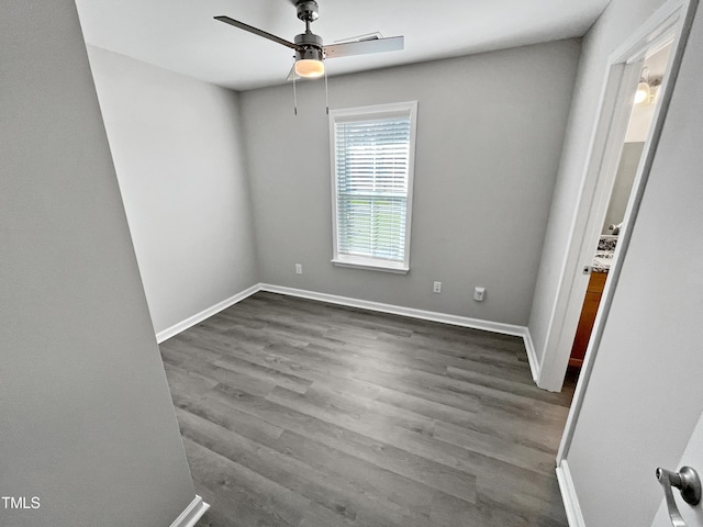 1505 Juniper St, Durham, NC 27703 - empty room featuring a ceiling fan, baseboards, and dark wood finished floors