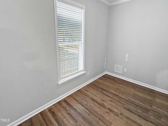 1505 Juniper St, Durham, NC 27703 - unfurnished room featuring dark wood finished floors, baseboards, and ornamental molding