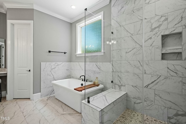 full bath featuring a freestanding tub, tile walls, marble finish floor, a stall shower, and crown molding