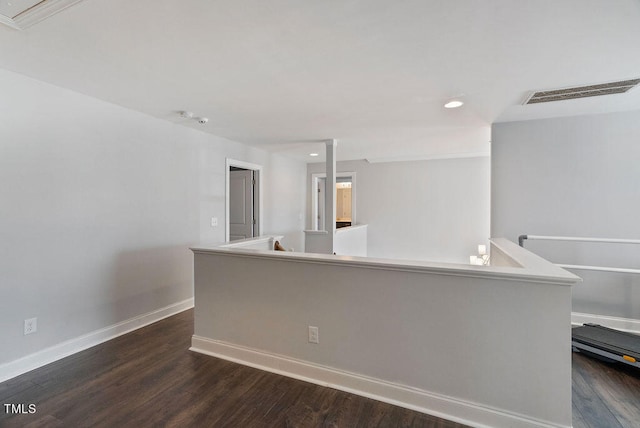 unfurnished room featuring dark hardwood / wood-style floors