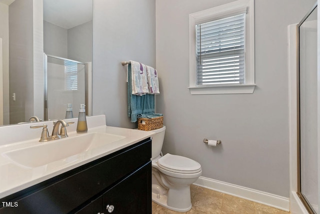 bathroom featuring tile patterned flooring, a shower with shower door, vanity, and toilet