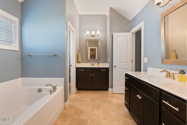 bathroom with a tub to relax in, vaulted ceiling, and vanity