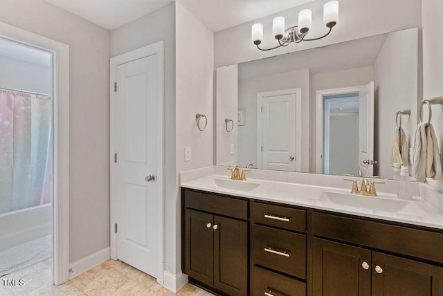 bathroom featuring vanity, tile patterned flooring, and a shower with shower curtain