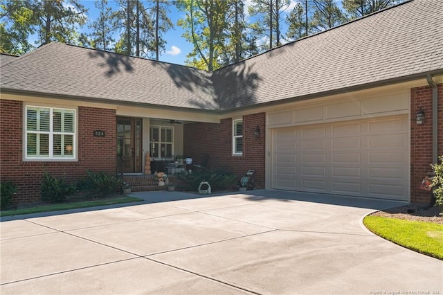 ranch-style house featuring a garage