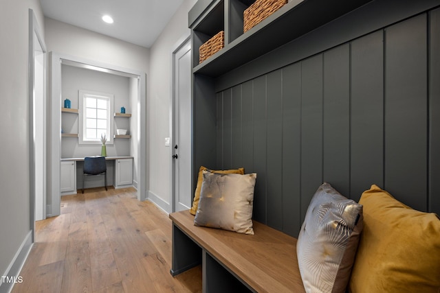 mudroom featuring light wood finished floors, baseboards, and recessed lighting