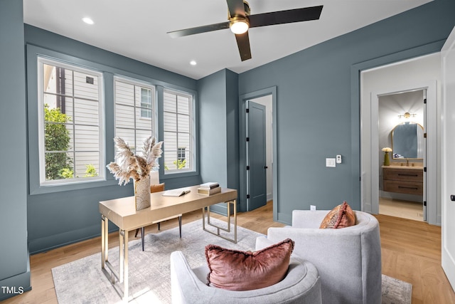home office featuring a ceiling fan, light wood finished floors, baseboards, and recessed lighting