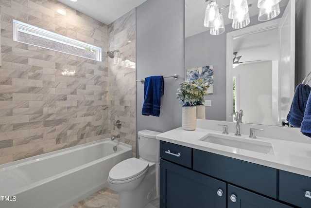 bathroom with plenty of natural light, toilet, shower / washtub combination, and vanity