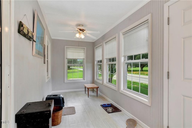 sunroom with ceiling fan