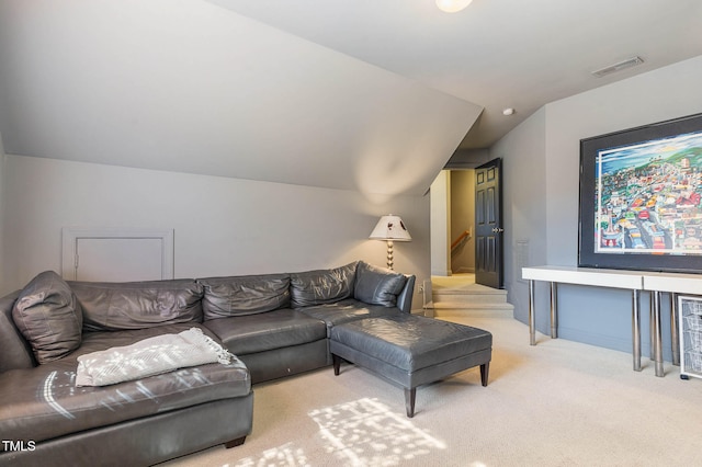 living room with visible vents, vaulted ceiling, stairway, and carpet flooring