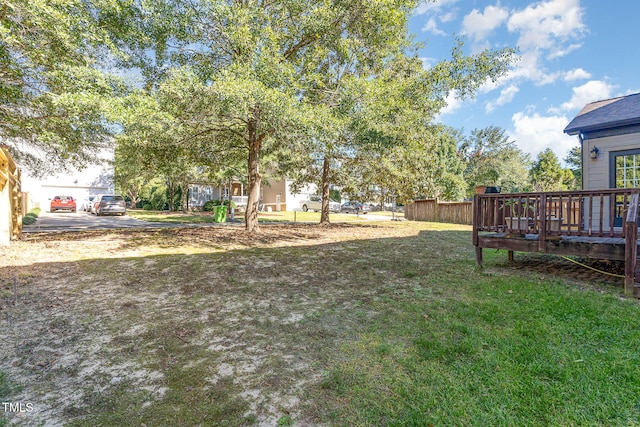 view of yard with a deck