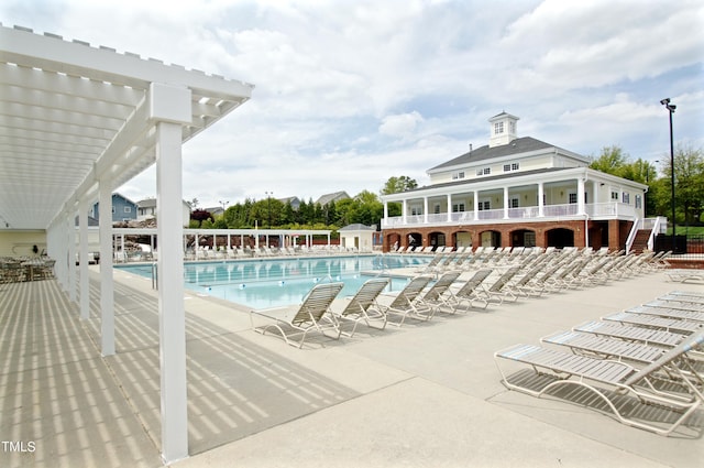 view of pool featuring a patio area