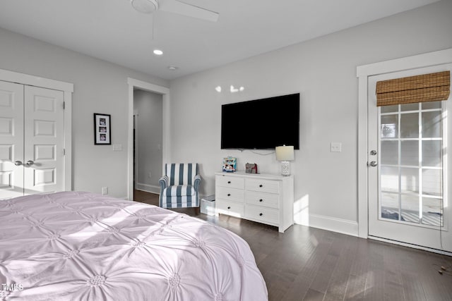 bedroom with a closet, ceiling fan, and dark hardwood / wood-style floors