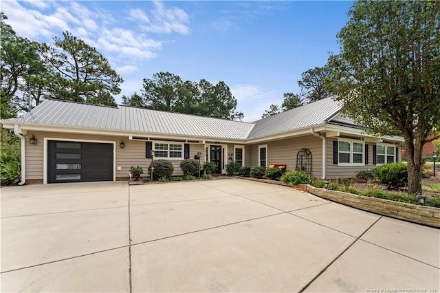 ranch-style home with a garage