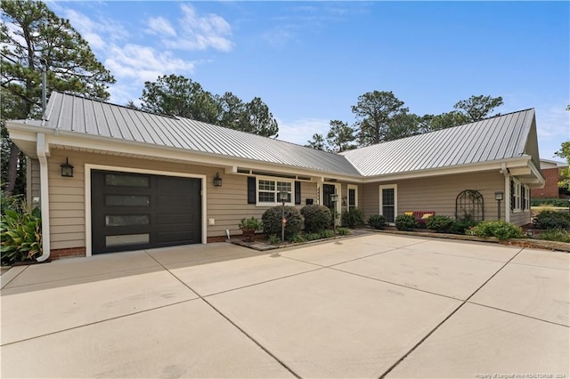 single story home with a garage