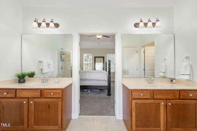 bathroom with vanity, ceiling fan, and tile patterned floors