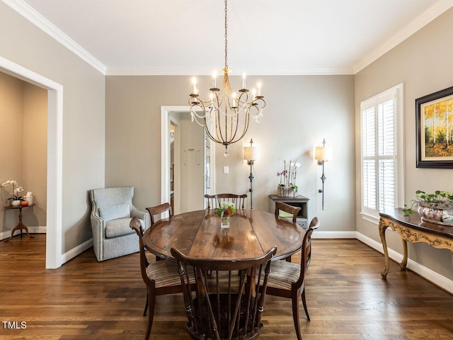 dining room featuring an inviting chandelier, dark wood-type flooring, and ornamental molding