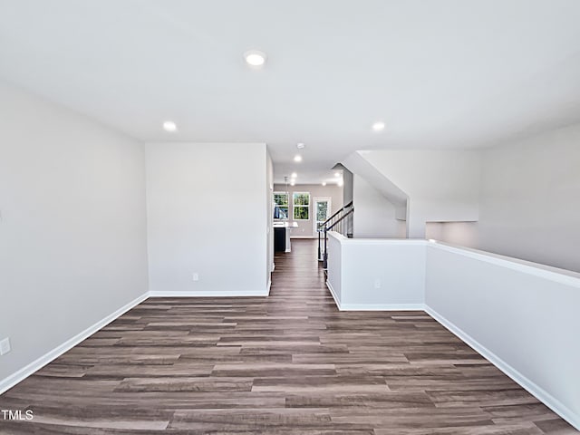 unfurnished room featuring dark hardwood / wood-style flooring