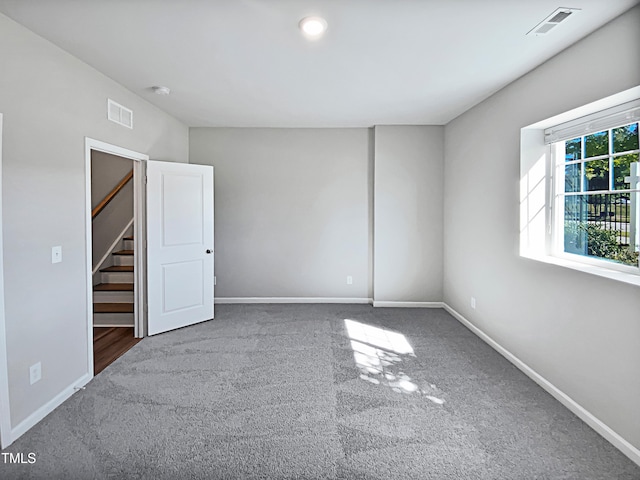 view of carpeted spare room