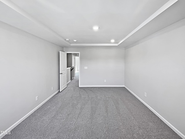 unfurnished room with carpet floors