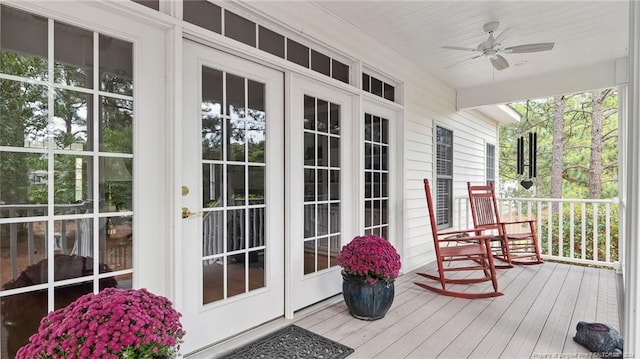 wooden deck with ceiling fan