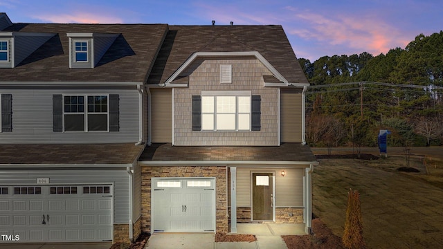 view of front of property featuring a garage