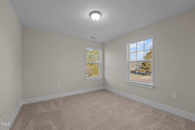 view of carpeted spare room