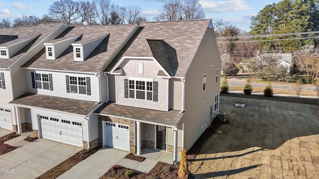 view of front of home featuring cooling unit