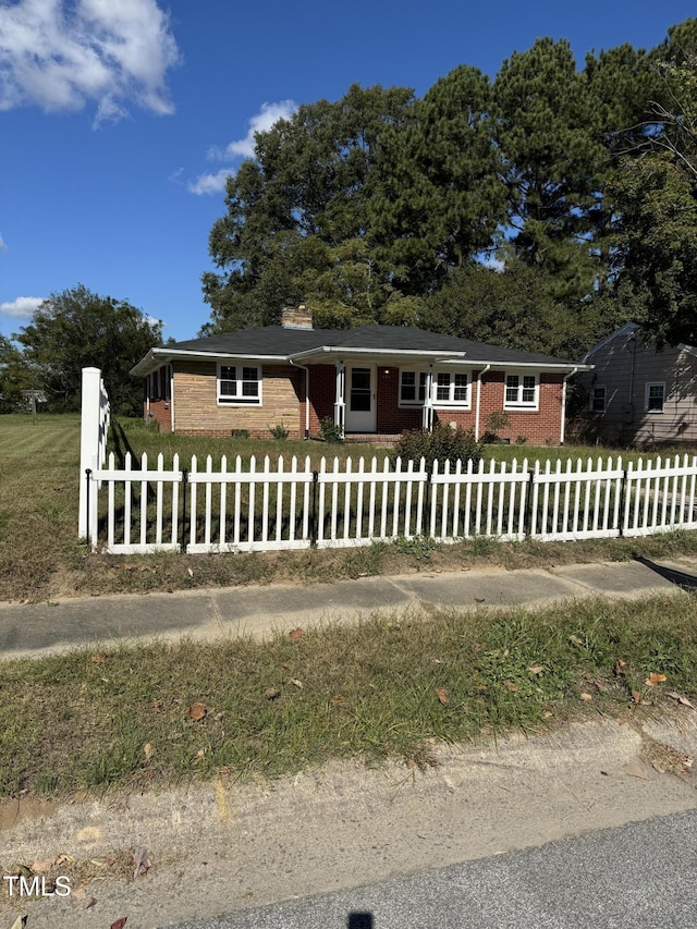 405 Whitfield Dr, Goldsboro, NC 27530 - single story home featuring a chimney and brick siding