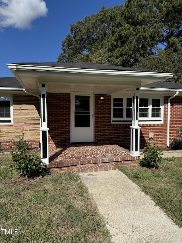 405 Whitfield Dr, Goldsboro, NC 27530 - view of front of property with brick siding and covered porch
